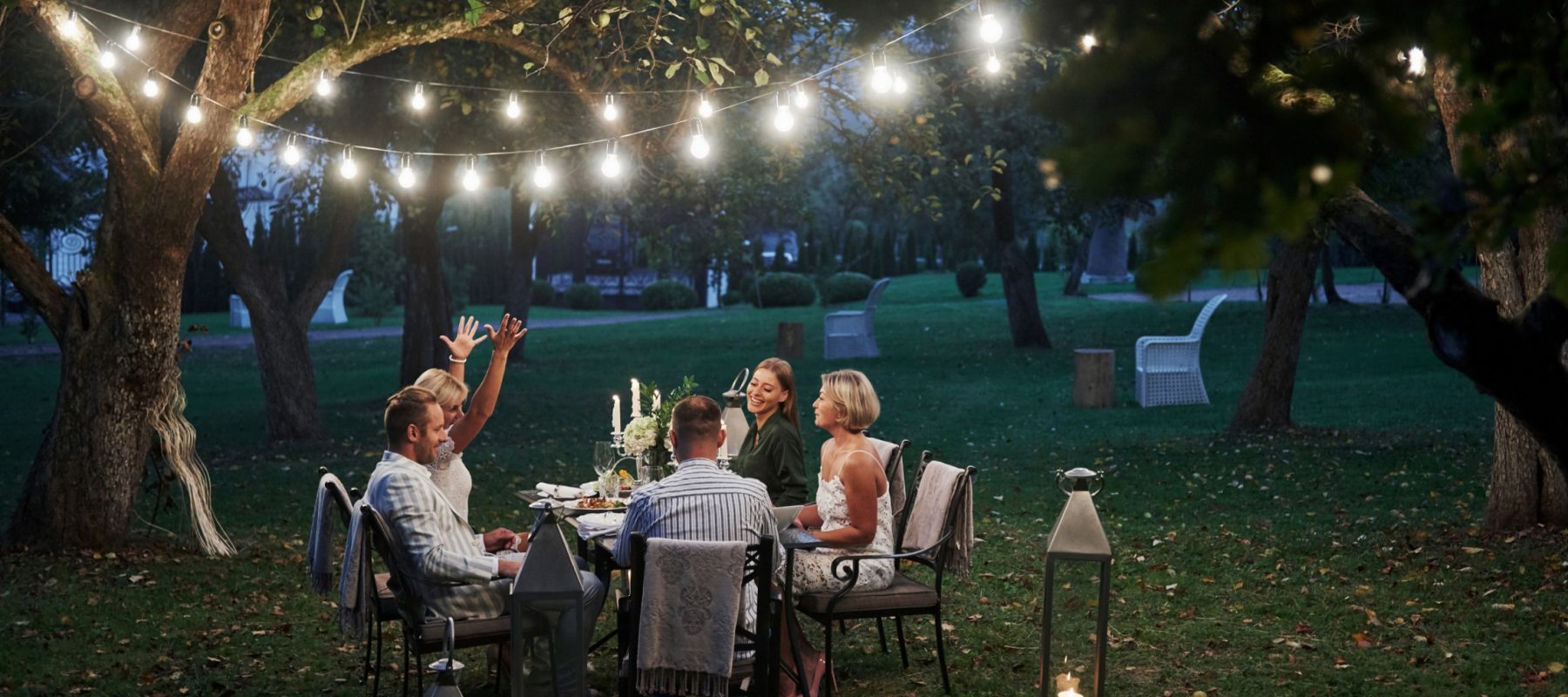 active-conversation-evening-time-friends-have-dinner-gorgeous-outdoor-place